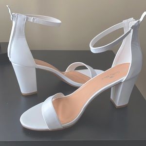 Guilty Heart Women’s Ankle Strap Chunky Block Heel W/ Zipper Closure.